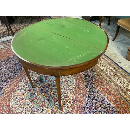 101 - A Georgian mahogany card table with half round folding top, on square tapered legs - 36in. wide