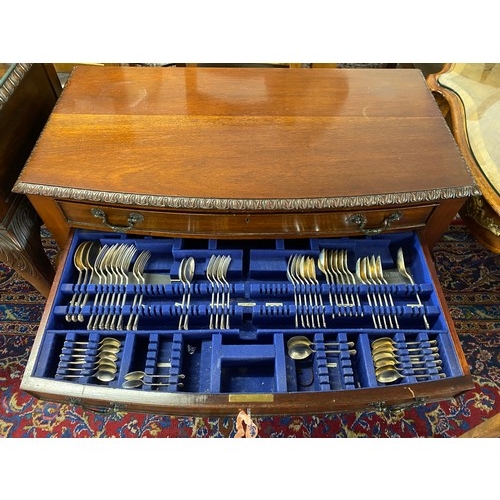 170 - A mahogany canteen table with nulled edge, fitted two drawers enclosing silver flatware comprising:-... 