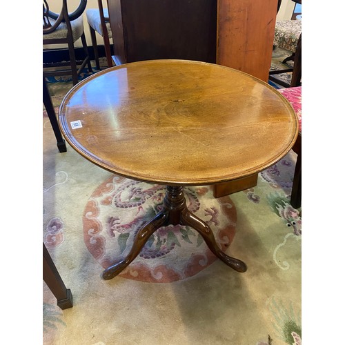 57 - A 19th Century mahogany occasional table with circular top, on turned column and three downswept leg... 