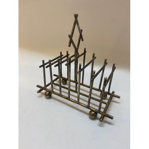180 - A silver plated toastrack in the Christopher Dresser style