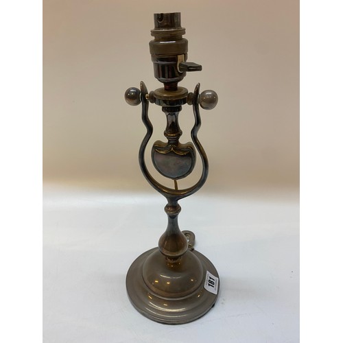 181 - A silver plated ships tablelamp with gimbal column