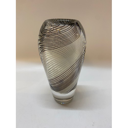 173 - A heavy Kosta vase with black and white swirl decoration - 10in. high