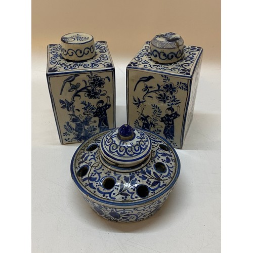 150 - A pair of antique Delft Faience tea canisters of square form decorated in the Oriental taste with fi... 