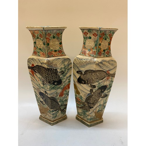 141 - A pair of Japanese panelled vases painted carp and crayfish, flowers to the neck - 15in. high