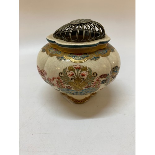 142 - A Japanese Satsuma koro and cover of lobed form painted in enamel colours with moths, stylised flowe... 