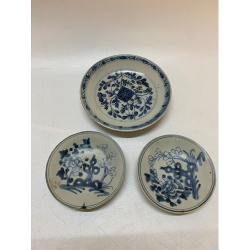 161 - Two Tek Sing blue and white dishes painted flowers - 4 1/2in. dia. and a larger ditto painted flower... 