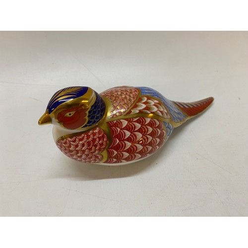 154 - A Royal Crown Derby paperweight in the form of a pheasant, gold button to the base