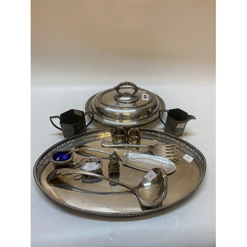 189 - Two silver napkin rings, a silver plated entree dish, a silver plated oval galleried tray etc..