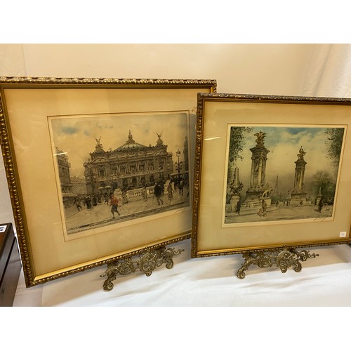 72 - A pair of 1920's engravings - Paris street scenes, signed in pencil to the mounts, gilt framed and g... 