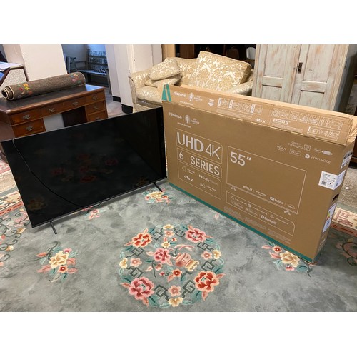 115 - A Hisense 55in. flatscreen television complete with wall bracket