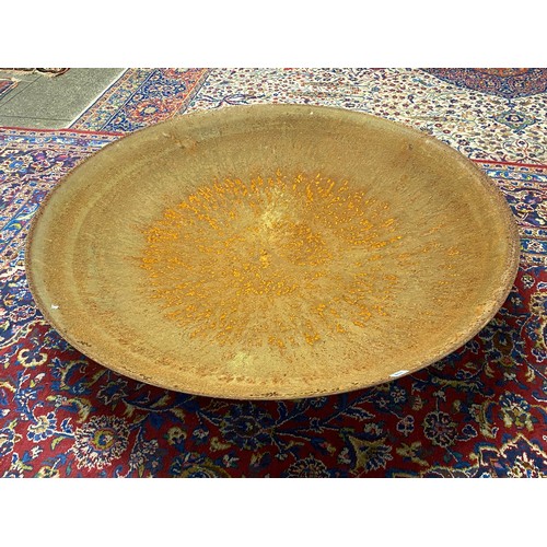 118 - A large steel fire pit on stand - 47in. dia. and 9in. high