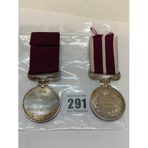 291 - An Army Long Service and Good Conduct medal and Meritorious Service Medal awarded to Q.M Sjt. C.E Me... 