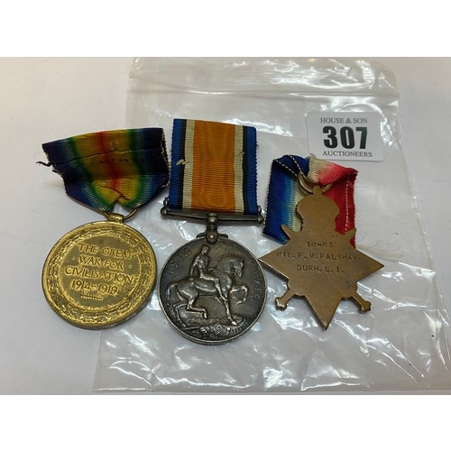 307 - A group of three First World War medals awarded to 18-63 Pte. F.M Falshaw Durh.L.I