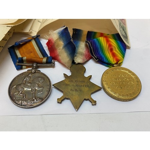 313 - A group of three First World War medals awarded to SS.21575 Pte. H Coates A.S.C together with a Lett... 