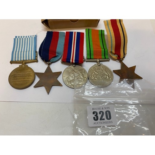 320 - A United Nations medal with Korea bar, a 1939-45 Star, Africa Star, War and Defence medal