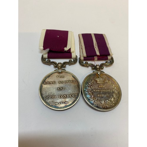 273 - A pair of medals awarded to 24904 Cy:S:Maj. J. Innes R.A. comprising:- Army Long Service And Good Co... 