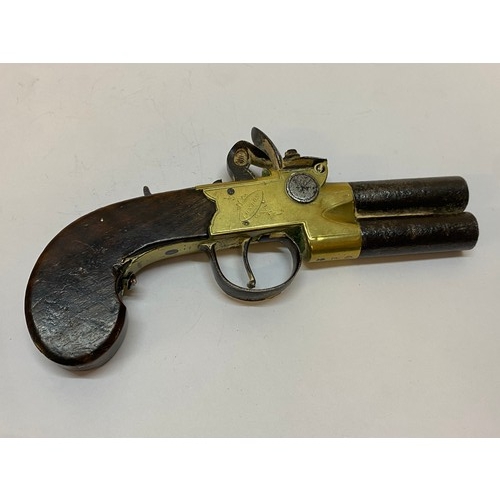 325 - An antique pistol marked to the brass plates Goodwin of London