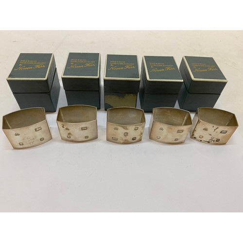 159 - A set of eight silver napkin rings of rectangular form, in original boxes - London 1978