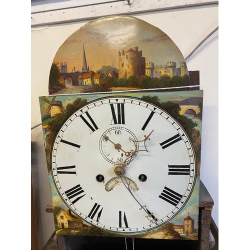 73 - A 19th Century longcase clock with white enamel dial painted with a castle to the arch, buildings to... 