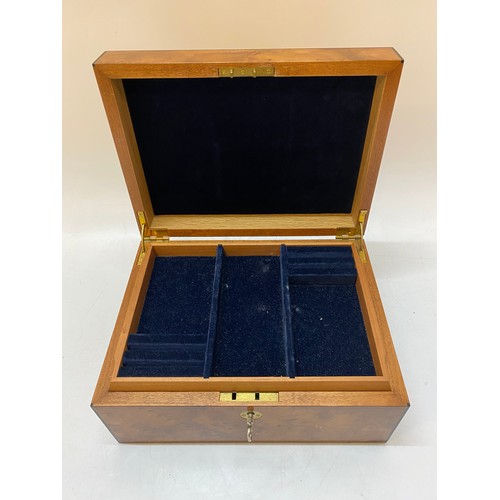 335 - A yewwood jewellery box, the interior fitted tray - 10 1/2in. wide