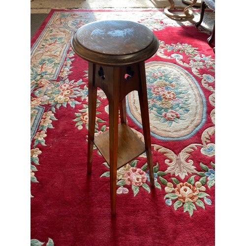 61 - A Victorian walnut, satinwood and ebony inlaid occasional table with octagonal top, on fluted legs t... 