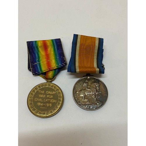 247 - A pair of First World War medals awarded to 4501 Pte. G Le Moigne 1-R Guernsey