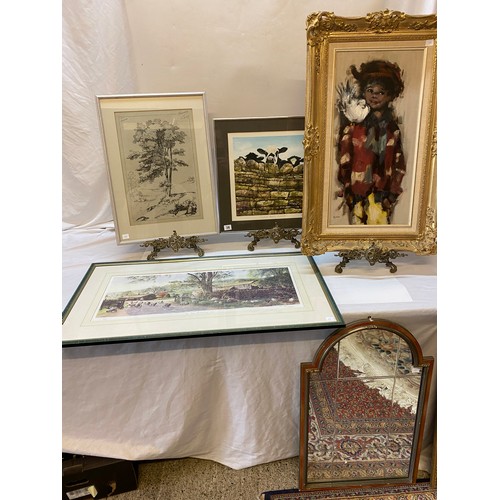 29 - A selection of decorative pictures and prints, wall mirror in an arched frame etc..