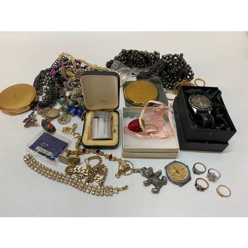 189 - A selection of costume jewellery including a compact, necklaces, paste set bracelet, wristwatch etc.... 
