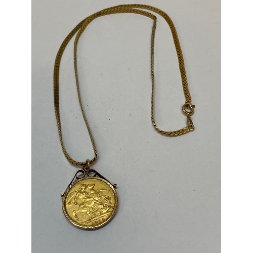 186 - A Victorian gold sovereign dated 1883 mounted as a pendant in a 9ct. gold frame, on a 9ct. gold flat... 