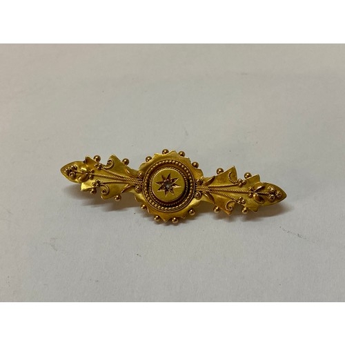 195 - A Victorian 15ct. gold lozenge shaped brooch