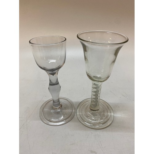 149 - Two antique wines with airtwist stem and knop baluster form stem, on folded feet