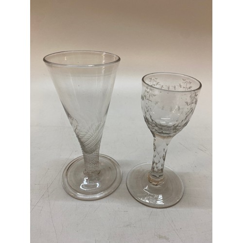 150 - Two antique wines with wrythen bowl, folded foot and the other with thumb pressed bowl and faceted s... 