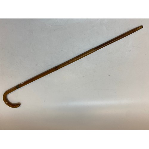 211 - A gentleman's walking stick converting to an umbrella