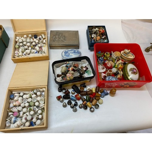 159 - A quantity of silver, silver and enamel, porcelain and other thimbles various