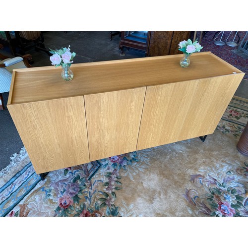 103 - A modern Skovby light oak dining room suite comprising:- dining table with extending circular top - ... 