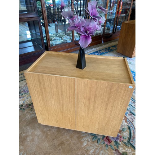 103 - A modern Skovby light oak dining room suite comprising:- dining table with extending circular top - ... 