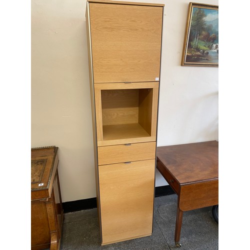 103 - A modern Skovby light oak dining room suite comprising:- dining table with extending circular top - ... 