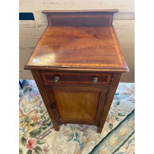 89 - An oak and iron bound barrel form stickstand and an Edwardian mahogany and inlaid bedside cabinet wi... 