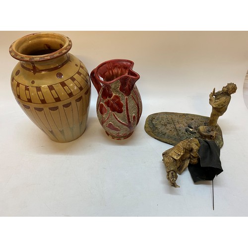 138 - A red pottery jug with cut decoration, a terracotta vase with beige glaze - 12in. high, a large pott... 