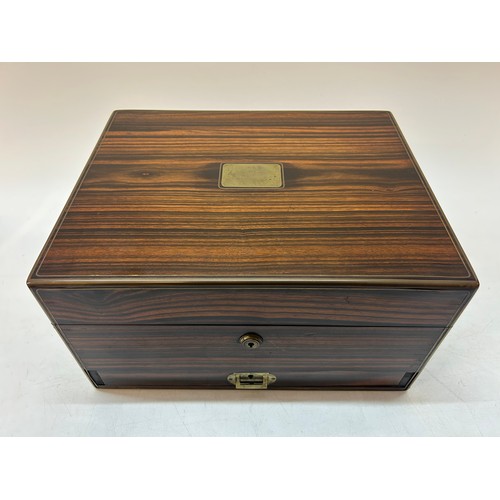 A 19th Century coromandel and brass banded jewellery box with hinged ...