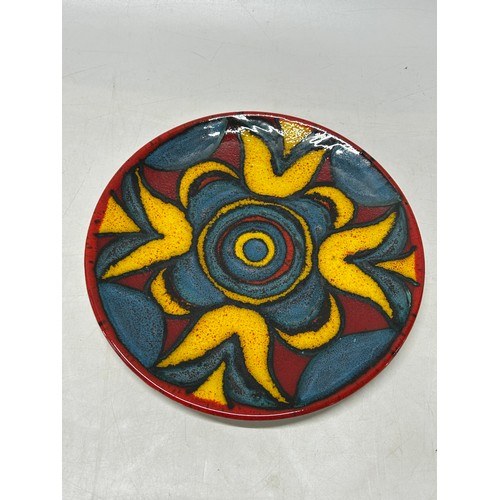 86 - A Janet Laird Studio pottery charger - Poole Zone - 10in. dia.