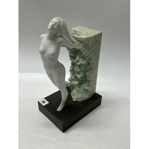95 - A Lladro bookend in the form of a female nude - 12in. high