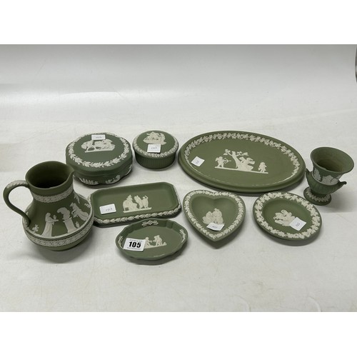 105 - A selection of Wedgwood green jasper wares including trinket boxes, dishes, jug etc..