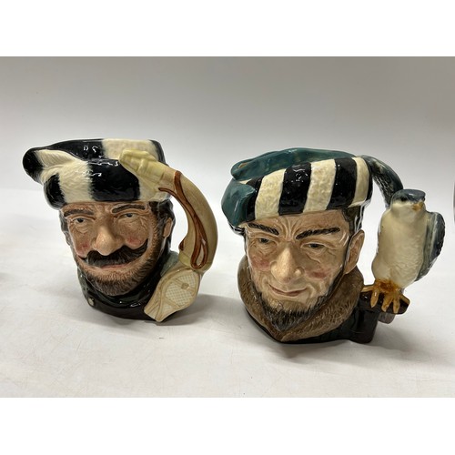 115 - Two Royal Doulton character jugs - Trapper and Falconer