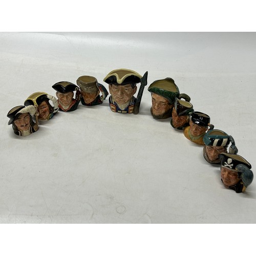 120 - Ten Royal Doulton character jugs including Athos, Night Watchman, Guardsman, Poacher etc..