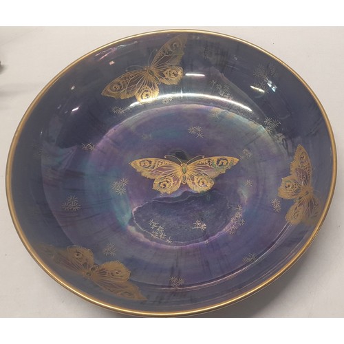 80 - A Shelley porcelain bowl, blue lustre decorated in gilt enamel with butterflies, signed to the base ... 