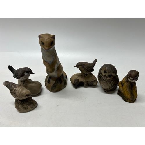 130 - Six Poole Pottery stoneware models comprising:- otter, owl, wren (2), finch and dormouse
