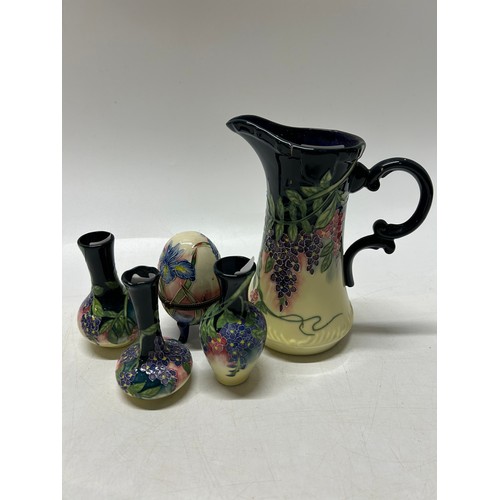 109 - Three small Tupton tube lined vases decorated flowers - 3 1/2in. high, a Tupton tube lined trinket b... 