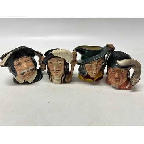 117 - Four Royal Doulton character jugs - Pied Piper, Gone Away, Athos and Sancho Panca