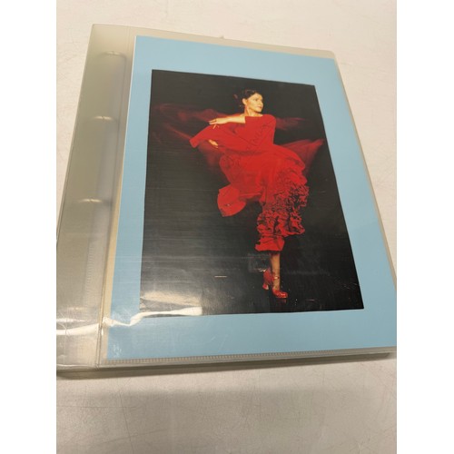 20 - A folder of coloured and black and white photographs bearing signatures comprising:- Sir George Mart... 